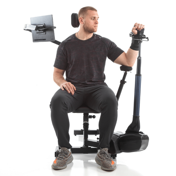 Omnidirectional resistance training for shoulder rehab. Patient performing shoulder exercises with omnidirectional resistance under therapist guidance.